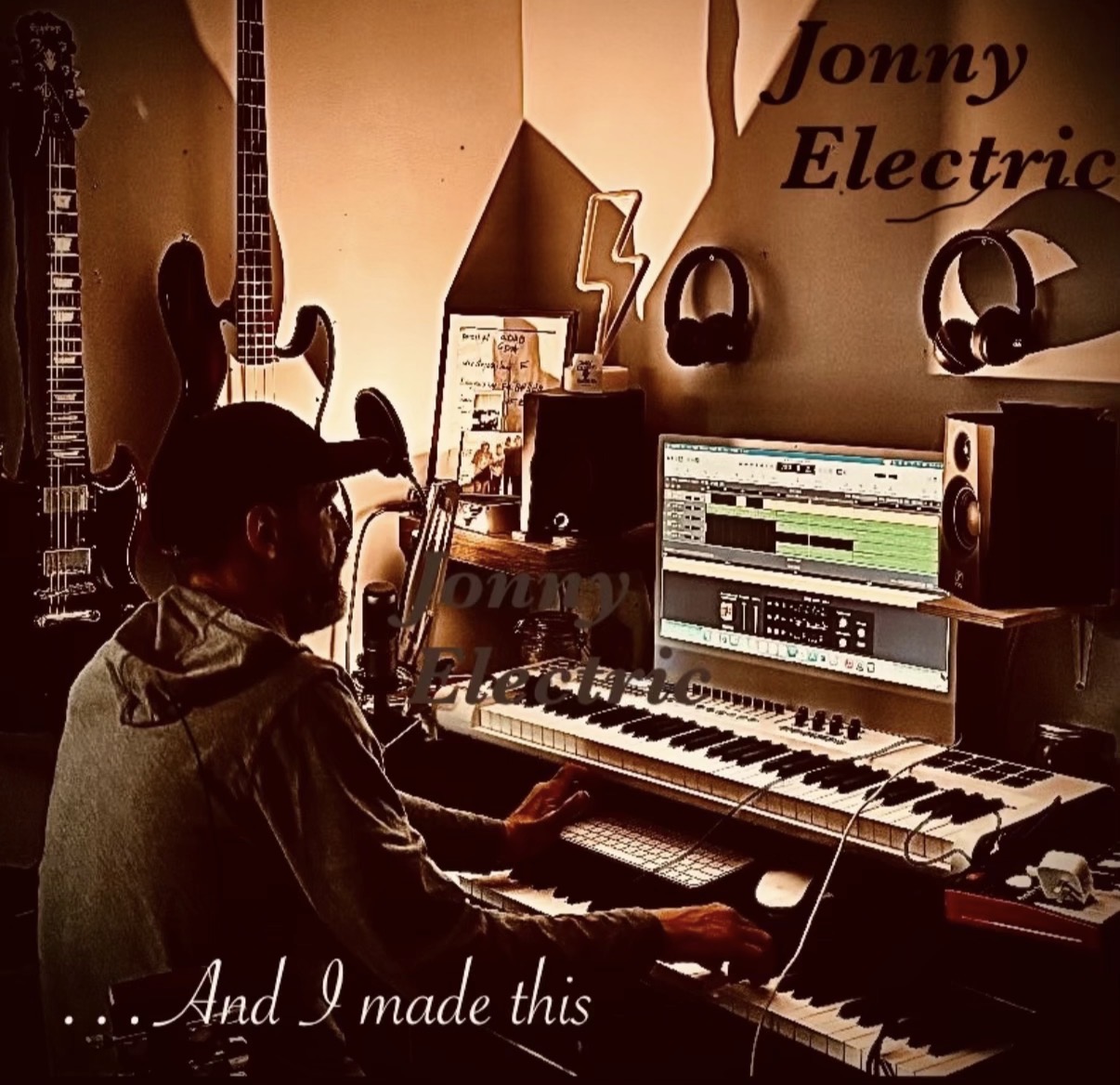 Jonny Electric working in the studio with the words And I made this